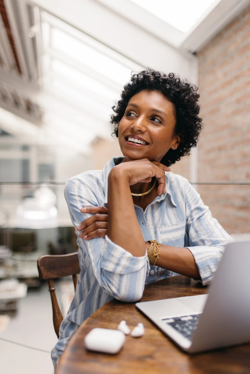 Woman looking up with a sense of hope and calm
